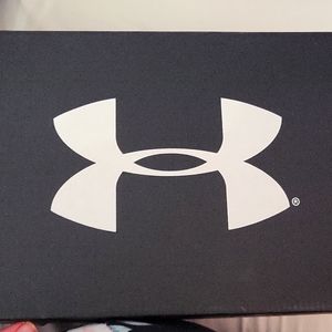 UA boys cleats,  brand new, never worn